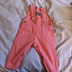 Red pinstripe overalls.